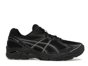 Sneaker ASICS GT-2160 JJJJound Black en mesh noir avec amorti GEL et design rétro-running minimaliste premium vue de profil 