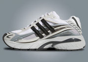 Sneakers adidas Adistar Jellyfish Pharrell Williams en Solid Grey et Black avec mesh respirant et amorti Adistar réactif.