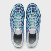 Adidas F50 Ghost Sprint Bad Bunny Dark Marine avec tige textile bleu marine, dégradé bleu clair, motif effet toile d’araignée et semelle extérieure en caoutchouc.