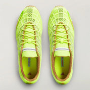 Adidas F50 Ghost Sprint Bad Bunny Solar Slime avec tige textile jaune-vert Solar Slime, détails noirs, motif inspiré de la F50 Spider et semelle extérieure en caoutchouc.