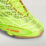 Adidas F50 Ghost Sprint Bad Bunny Solar Slime avec tige textile jaune-vert Solar Slime, détails noirs, motif inspiré de la F50 Spider et semelle extérieure en caoutchouc.