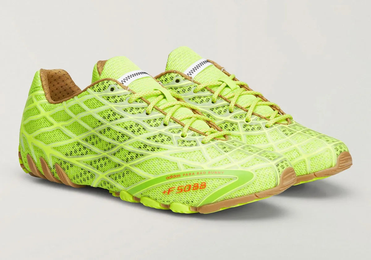 Adidas F50 Ghost Sprint Bad Bunny Solar Slime avec tige textile jaune-vert Solar Slime, détails noirs, motif inspiré de la F50 Spider et semelle extérieure en caoutchouc.