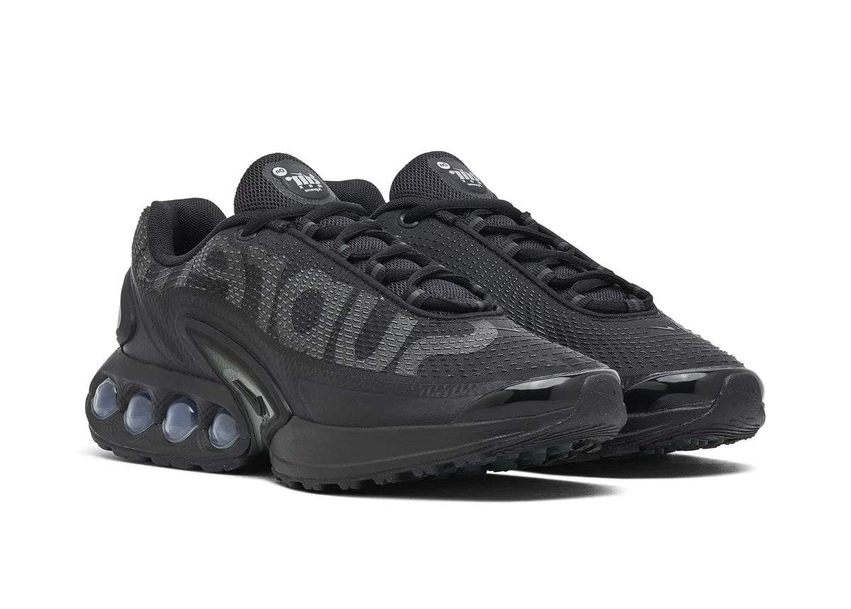 Nike Air Max Dn Supreme Black, sneaker noire issue de la collaboration Supreme x Nike avec semelle Dynamic Air et détails Supreme.