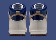 Nike SB Dunk High Pro Beyond, sneakers de skateboard avec tige montante, amorti Zoom Air et semelle extérieure adhérente.