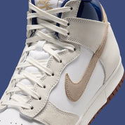 Nike SB Dunk High Pro Beyond, sneakers de skateboard avec tige montante, amorti Zoom Air et semelle extérieure adhérente.