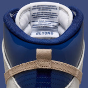Nike SB Dunk High Pro Beyond, sneakers de skateboard avec tige montante, amorti Zoom Air et semelle extérieure adhérente.