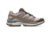 Sneakers Salomon XT-4 OG Bodega The Glider en mesh technique avec Agile Chassis System et semelle Contagrip dans un design collaboratif premium.