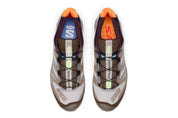 Sneakers Salomon XT-4 OG Bodega The Glider en mesh technique avec Agile Chassis System et semelle Contagrip dans un design collaboratif premium.