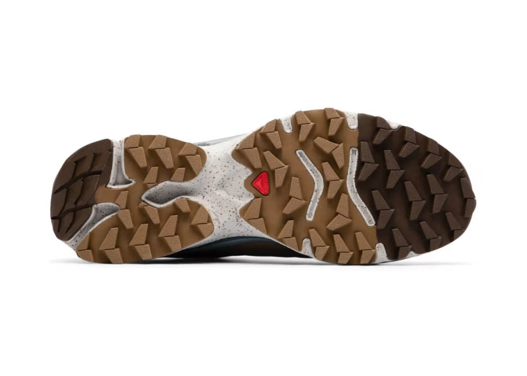 Sneakers Salomon XT-4 OG Bodega The Glider en mesh technique avec Agile Chassis System et semelle Contagrip dans un design collaboratif premium.