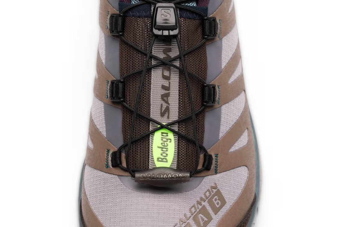 Sneakers Salomon XT-4 OG Bodega The Glider en mesh technique avec Agile Chassis System et semelle Contagrip dans un design collaboratif premium.