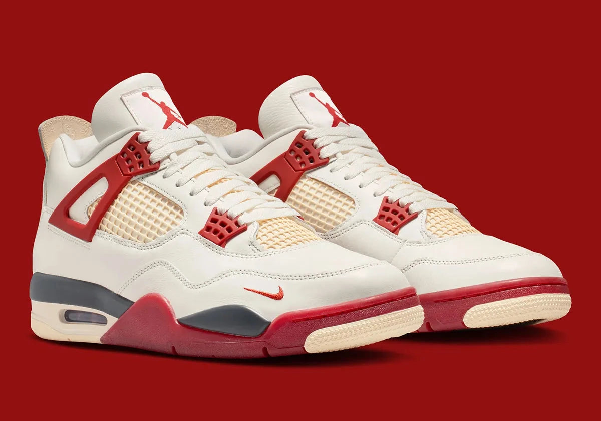 Sneaker Air Jordan 4 Nigel Sylvester Brick By Brick rouge brique en suède premium avec semelle Air visible et détails OG iconiques.