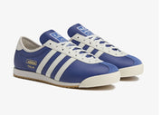 Sneakers adidas Italia SPZL C.P. Company Collegiate Royal en matériaux premium avec détails collaboratifs et semelle fine confortable vue de 3/4 face. 