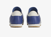 Sneakers adidas Italia SPZL C.P. Company Collegiate Royal en matériaux premium avec détails collaboratifs et semelle fine confortable vue de derrière. 