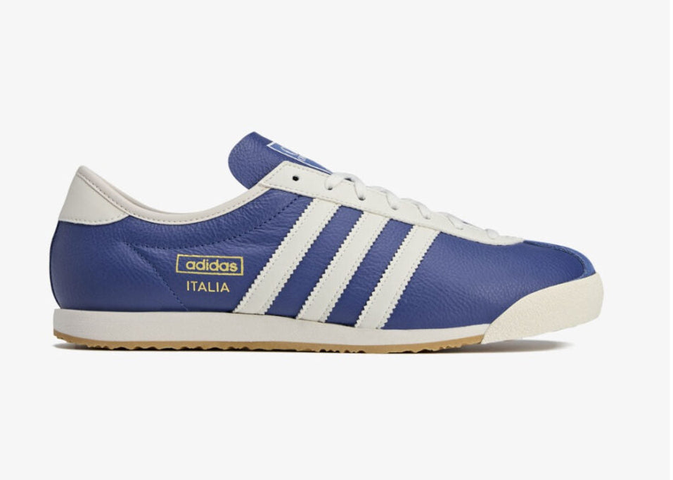 Sneakers adidas Italia SPZL C.P. Company Collegiate Royal en matériaux premium avec détails collaboratifs et semelle fine confortable vue de profil. 