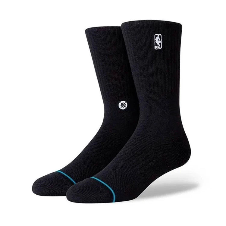 calcetines-stance-logoman-st-1-par-black-0_a1c1f0cd-8c38-411e-a3da-71e21316c12f.webp
