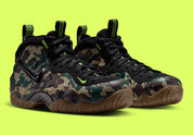 Nike Air Foamposite Pro Army Camo 2026, sneaker Nike Foamposite au motif camouflage vert kaki et noir avec coque moulée et Swoosh latéral.