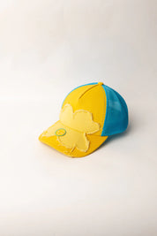 Casquette Torom Jaune/Bleu – casquette streetwear en coton premium jaune et bleu avec logo brodé, vue de face