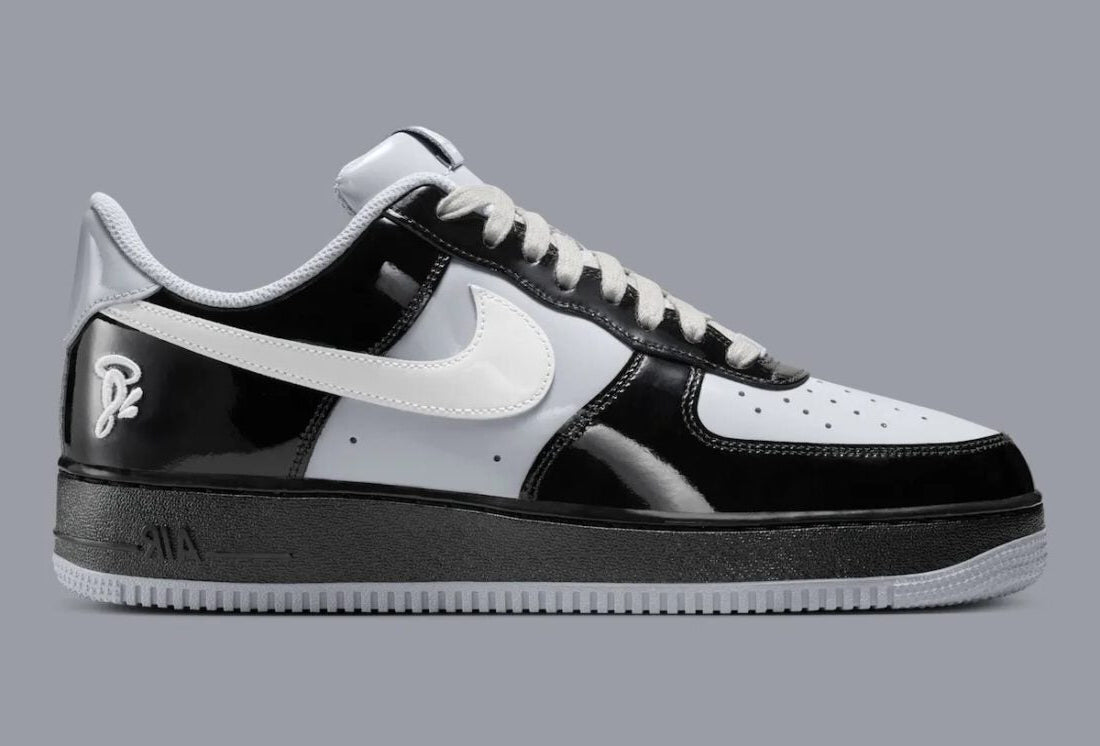 Sneakers Nike Air Force 1 Low en cuir premium, coloris Black White Smoke Grey avec détails Central Cee signature et amorti Air encapsulé.