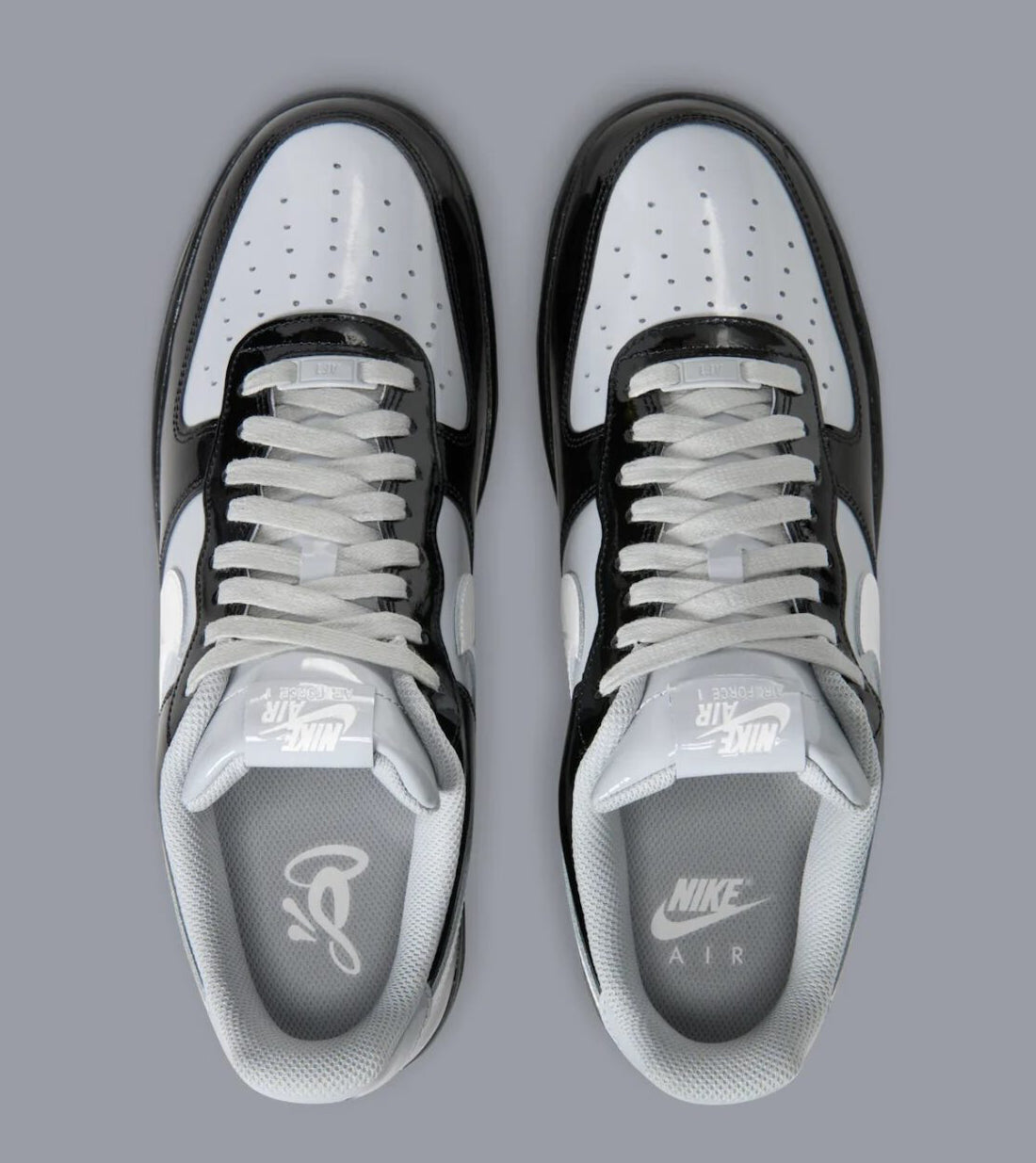 Sneakers Nike Air Force 1 Low en cuir premium, coloris Black White Smoke Grey avec détails Central Cee signature et amorti Air encapsulé.