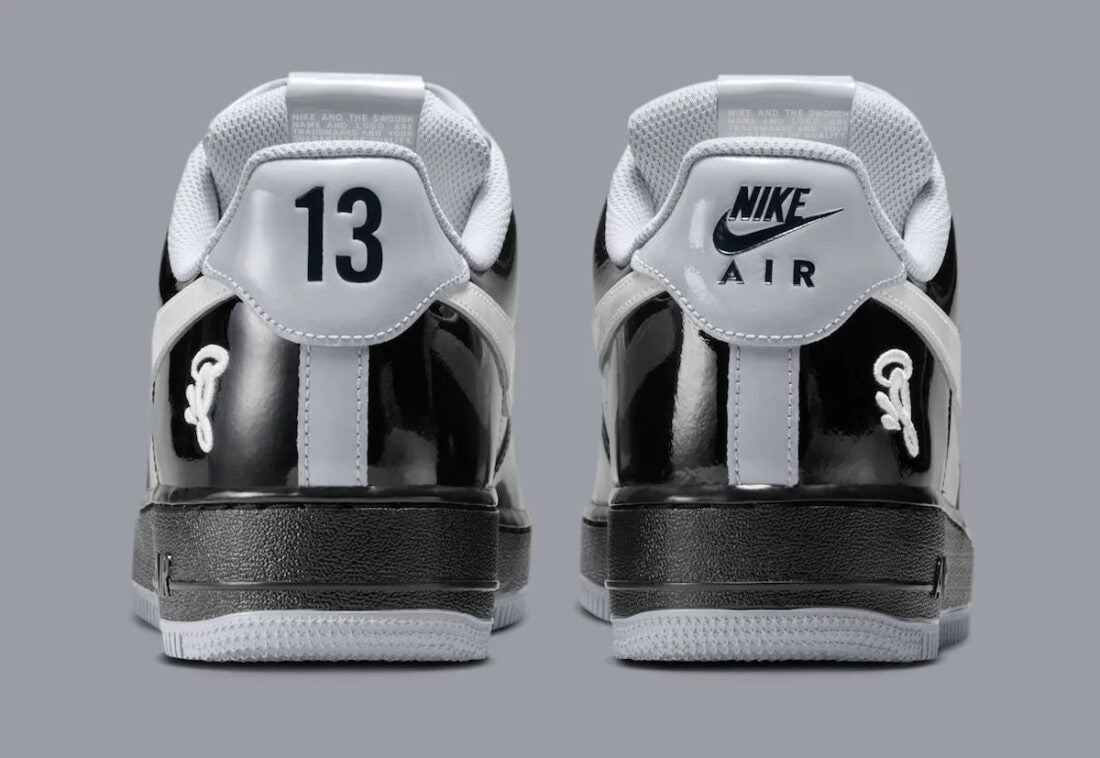 Sneakers Nike Air Force 1 Low en cuir premium, coloris Black White Smoke Grey avec détails Central Cee signature et amorti Air encapsulé.