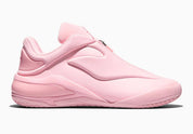 Converse SHAI 001 Blush, sneaker de basketball rose monochrome avec empeigne moulée sculptée, cache zippé et silhouette basse futuriste.