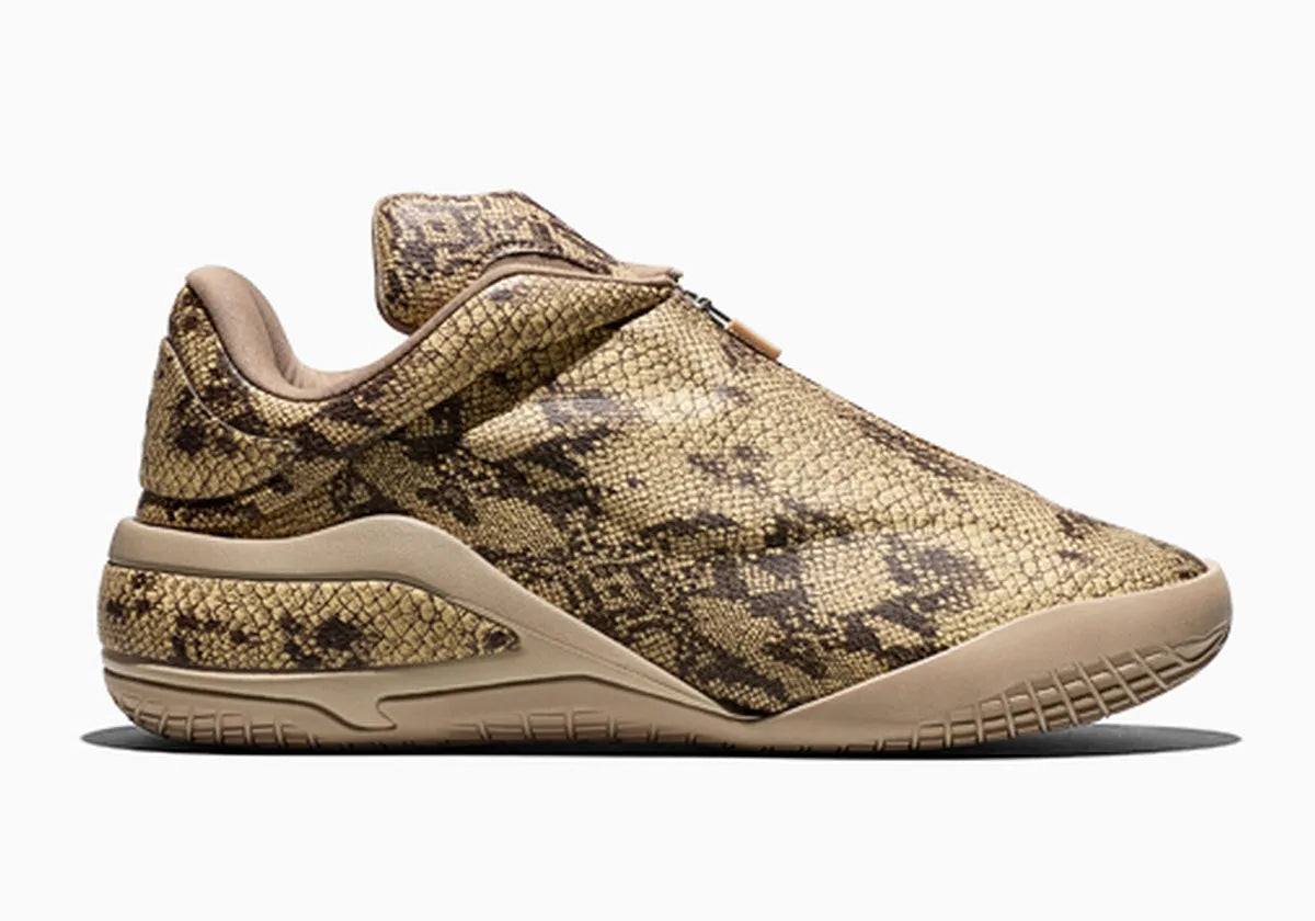 Converse SHAI 001 Premium Slither, sneaker de basketball à empeigne synthétique effet peau de serpent avec fermeture zippée et silhouette sculptée.