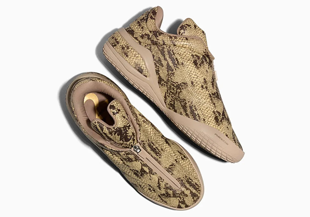 Converse SHAI 001 Premium Slither, sneaker de basketball à empeigne synthétique effet peau de serpent avec fermeture zippée et silhouette sculptée.