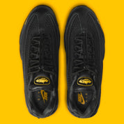 Nike Air Max 95 Corteiz Honey Black noire en cuir et mesh diamant avec détails Corteiz, logo Alcatraz et unités Air Max Tour Yellow vue du dessus. 