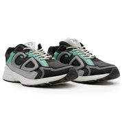 Dior B30 Anthracite Gray avec tige en mesh respirant, empiècements en cuir et matières techniques gris anthracite, silhouette running moderne et semelle en caoutchouc.