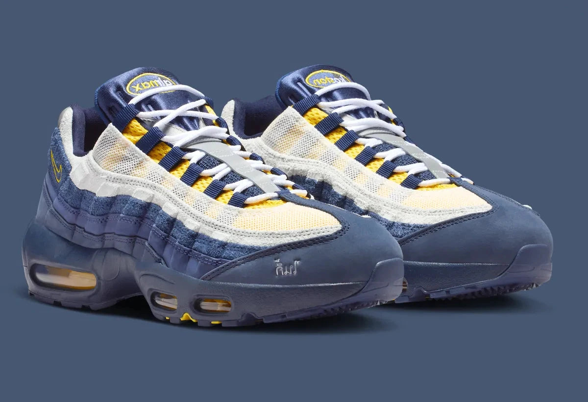 Sneakers Nike Air Max 95 SB Eric Koston bleu obsidian et jaune en matières renforcées avec amorti Air Max visible et design iconique. Vue 3/4

