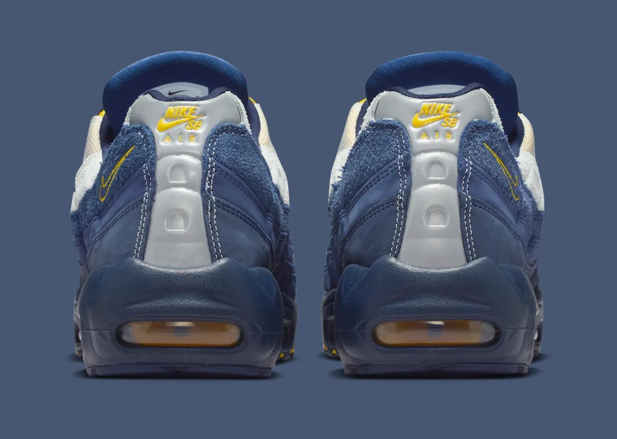 Sneakers Nike Air Max 95 SB Eric Koston bleu obsidian et jaune en matières renforcées avec amorti Air Max visible et design iconique. Vue de derrière 