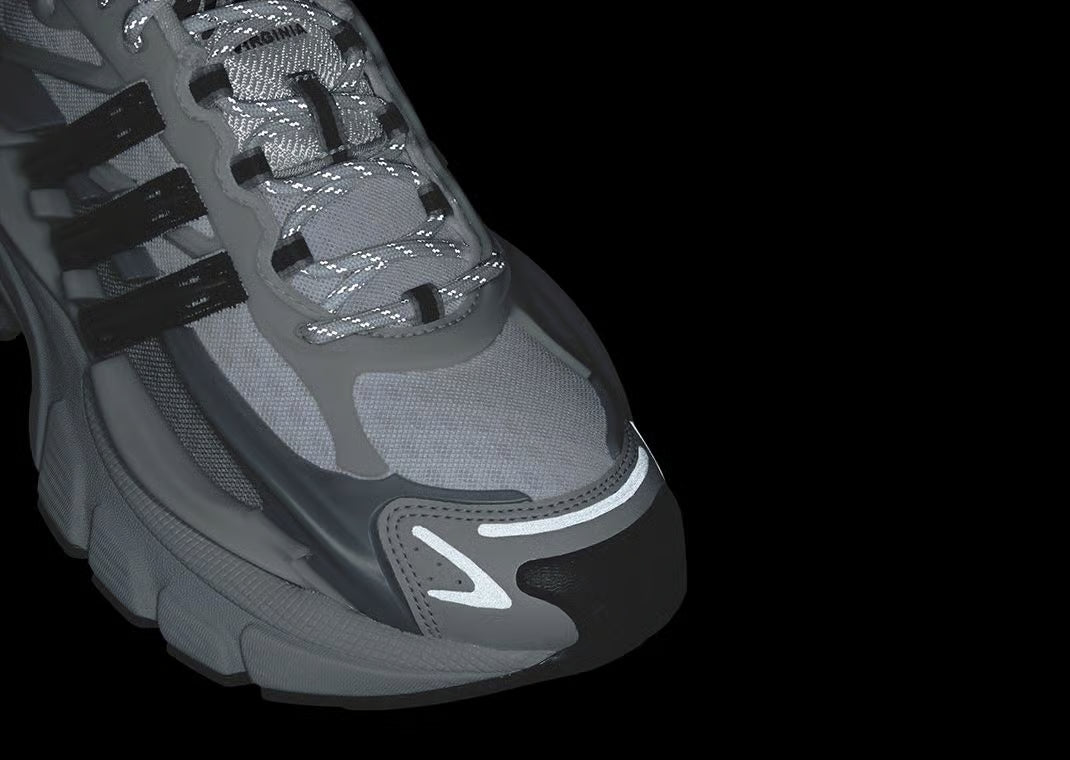 Sneakers adidas Adistar Jellyfish Pharrell Williams en Solid Grey et Black avec mesh respirant et amorti Adistar réactif.