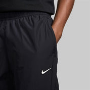 Nike x NOCTA Drake Northstar Nylon Track Pants Anthracite Grey, pantalon de survêtement en nylon gris anthracite avec poches zippées et logos NOCTA.