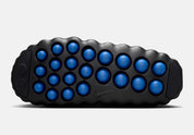 Claquette Nike Mind 001 Slide Fragment noire en mousse technique avec pods sensoriels et design minimaliste premium.