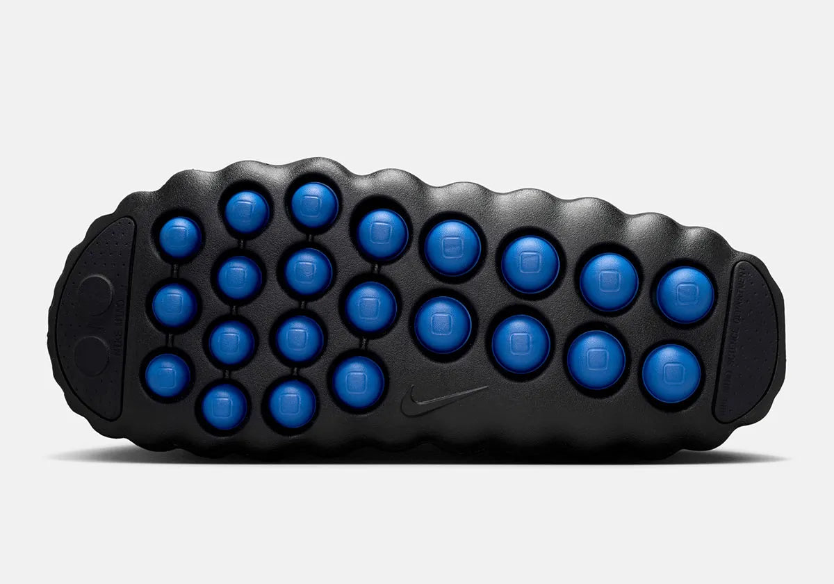 Claquette Nike Mind 001 Slide Fragment noire en mousse technique avec pods sensoriels et design minimaliste premium.