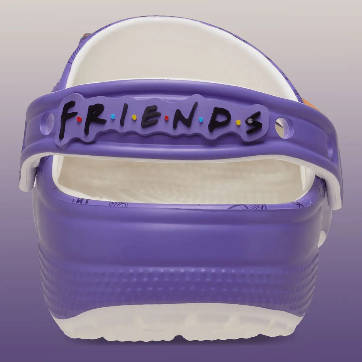 Crocs Classic Clog Friends inspirées de la série Friends, avec design exclusif, bride pivotante et semelle légère en résine Croslite™.