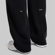 Nike x NOCTA Fleece CS Sweatpant Anthracite/Iron Grey, pantalon fleece gris anthracite avec poches zippées et détails réfléchissants NOCTA.