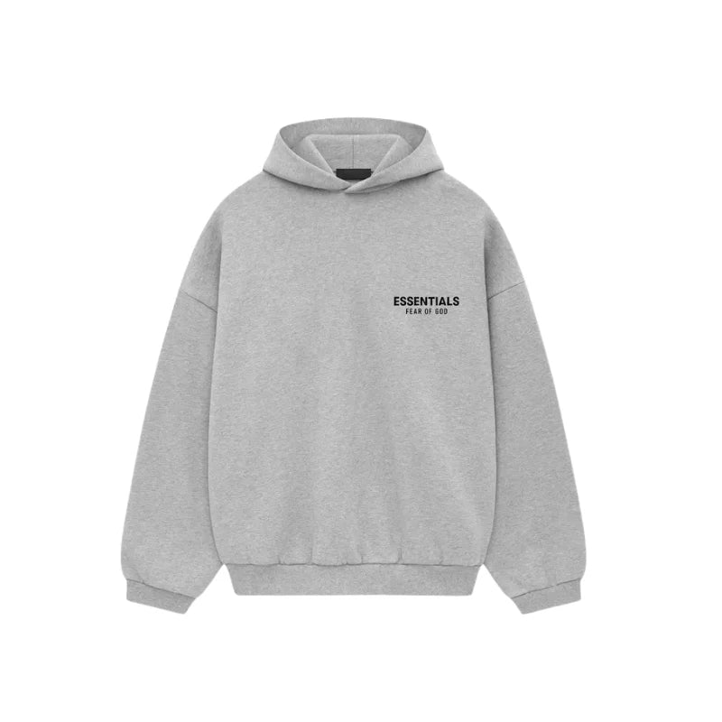Sweat Fear Of God Essentials gris clair chiné en coton épais avec coupe oversize et logo discret minimaliste