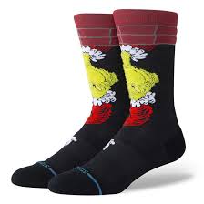 Stance Down The Chimney Crew noire, chaussettes montantes Crew en coton peigné avec design festif inspiré du Grinch et amorti léger.