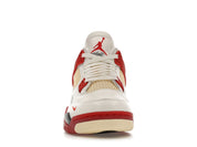 Sneaker Air Jordan 4 Nigel Sylvester Brick By Brick rouge brique en suède premium avec semelle Air visible et détails OG iconiques.