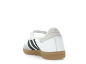 Sneaker adidas Samba Jane White Black Gum en cuir blanc avec bandes noires, bride Mary Jane et semelle gomme rétro emblématique.Vue arrières 