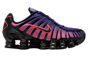 Sneakers Nike Shox TL en maille respirante et renforts synthétiques, coloris Court Purple et Hot Lava avec colonnes Shox amortissantes vue de profil intérieur. 