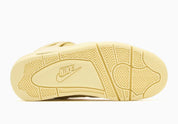 Air Jordan 4 Retro J Balvin Lemonade IW2872-700 en jaune Lemonade avec textures effet crocodile, détails multicolores et smiley J Balvin au talon vue du dessous.  