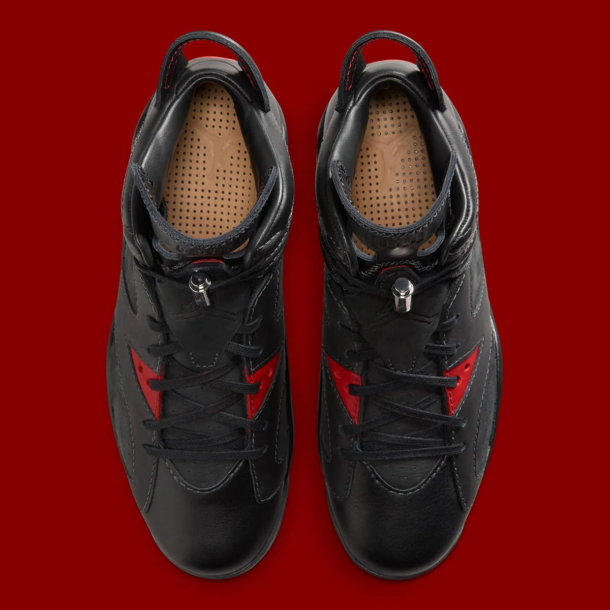 Air Jordan 6 Retro PRM Bin23 II6558-001 en cuir noir premium avec détails Picante Red, sceau Bin23 au talon et unité Air visible.