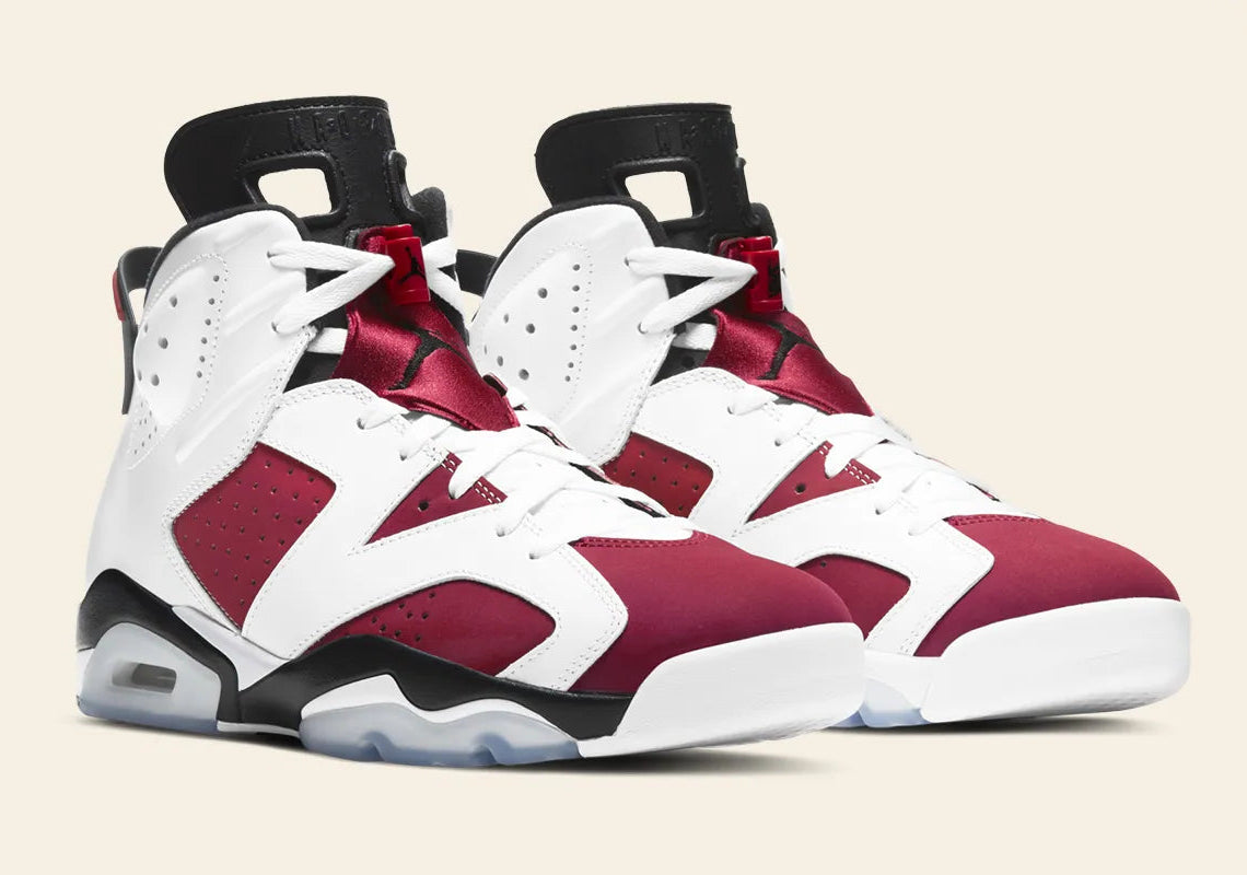 Air Jordan 6 Retro Carmine 2021 CT8529-106 en cuir blanc et nubuck rouge Carmine avec détails noirs, Nike Air et semelle translucide vue de 3/4 face. 