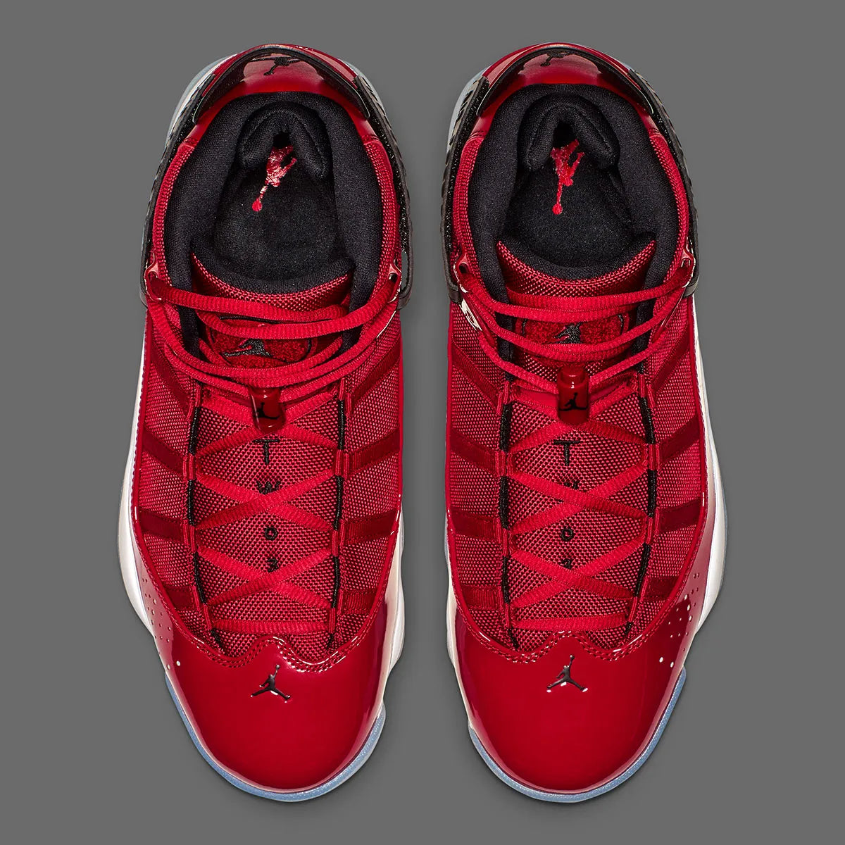 Air Jordan 6 Rings Gym Red 322992-601 rouge, noire et blanche avec empiècements brillants, mesh et silhouette basketball hybride.