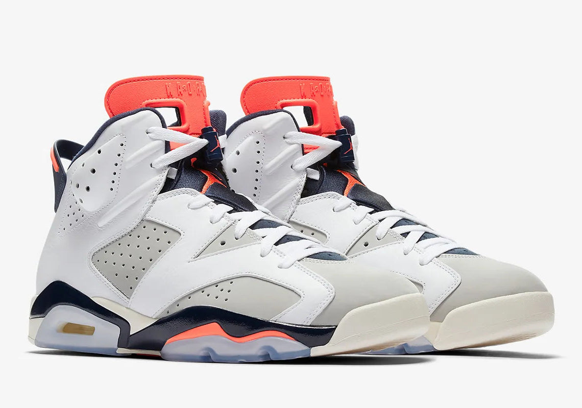 Air Jordan 6 Rings UNC 322992-041 noire et anthracite avec accents University Blue, empiècements en cuir verni et semelle Zoom Air.