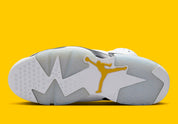 Air Jordan 6 Retro Yellow Ochre CT8529-170 en nubuck Yellow Ochre et cuir blanc avec accents noirs, lace lock jaune et unité Air visible.