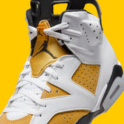 Air Jordan 6 Retro Yellow Ochre CT8529-170 en nubuck Yellow Ochre et cuir blanc avec accents noirs, lace lock jaune et unité Air visible.