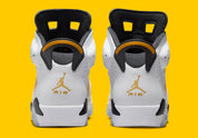 Air Jordan 6 Retro Yellow Ochre CT8529-170 en nubuck Yellow Ochre et cuir blanc avec accents noirs, lace lock jaune et unité Air visible.